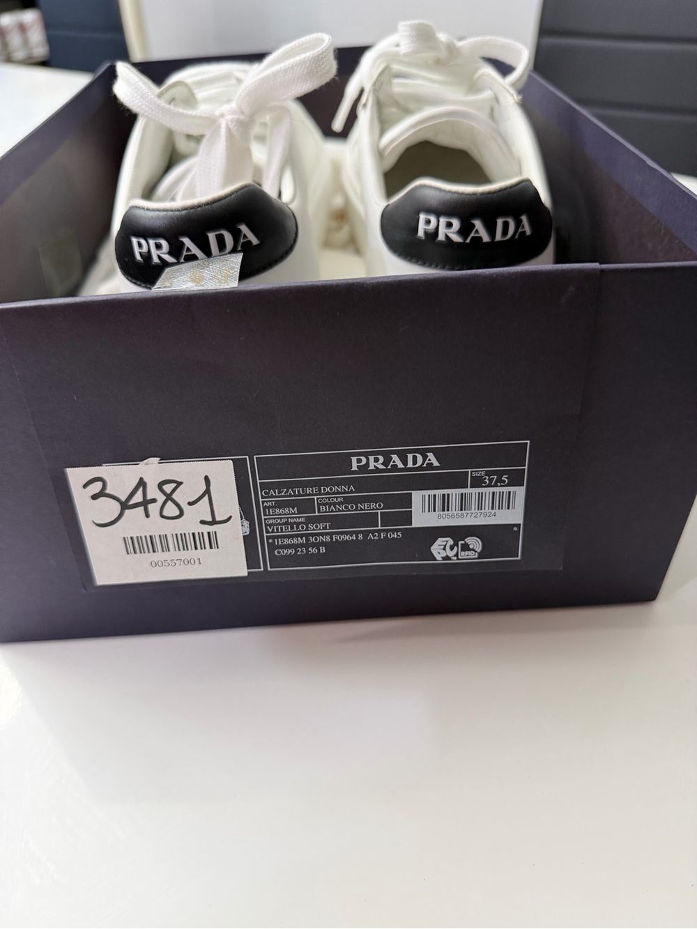 Prada White Leather Low-Top Sneakers with Black Heel Patch - Picture 2 of 4